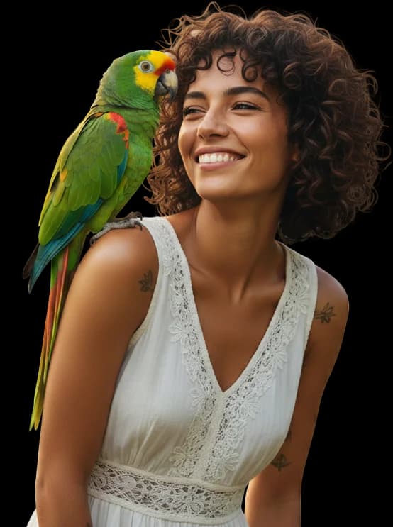 Hamza, Avian Care Lead at Dubai Birds, with a parrot at the Warsan 3 aviary